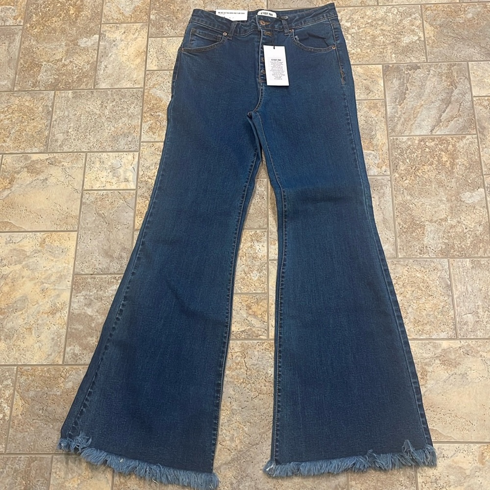 C’est Toi brand ladies mid rise flare jeans.
